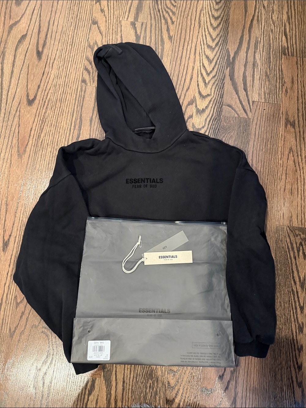 Essentials Black Pullover Hoodie with Subtle Logo fear of god have bag and tags